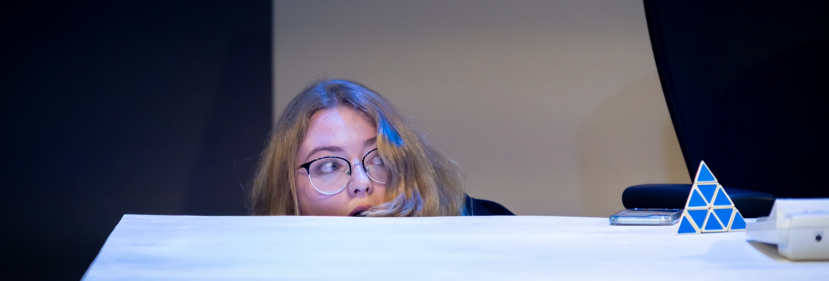 banner image bex_behind_desk