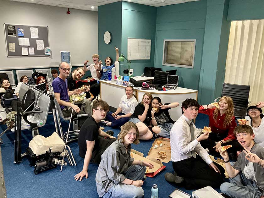 Taking a well-deserved pizza lunch break