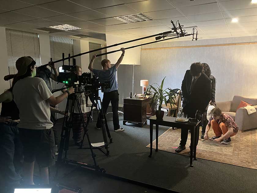 Two cameras = two booms = four aching arms