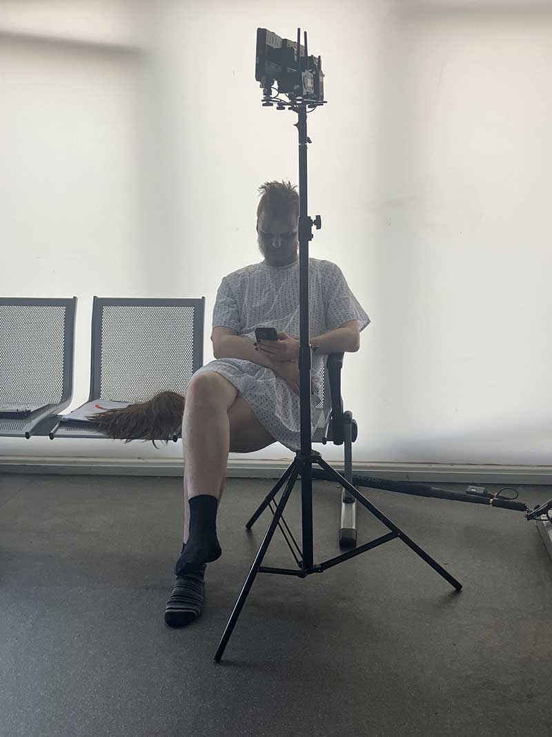 Alex relaxing between shots