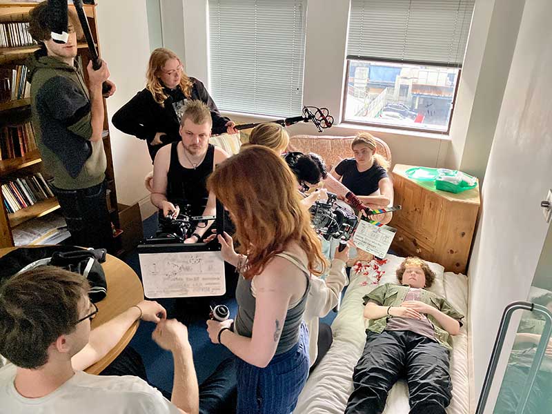 Seeing how many people we can get to film in a tiny room!